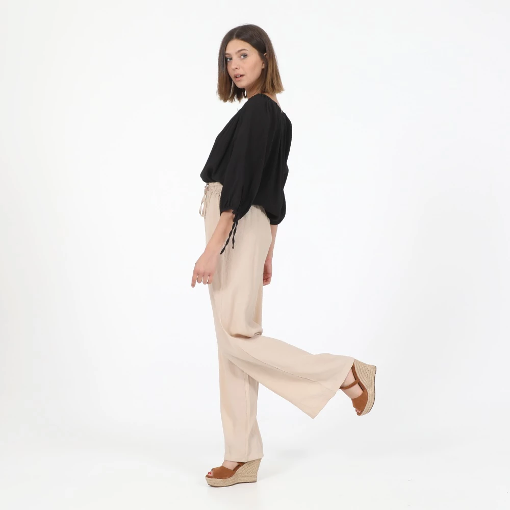 Γυναικεία παντελόνα ATTRATTIVO μπεζ 4 Γυναικεία παντελόνα ATTRATTIVO μπεζ - Image 4